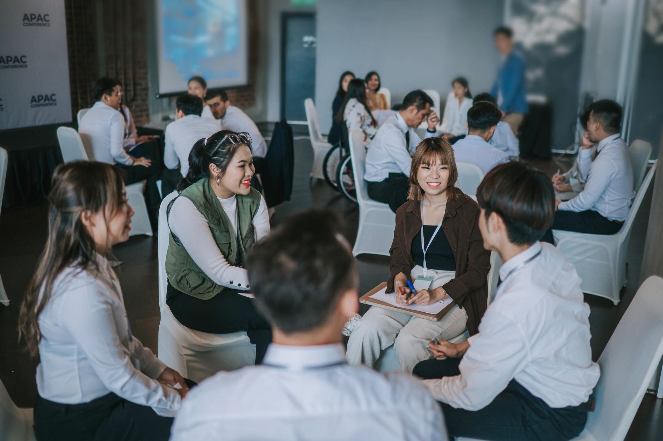 Workshop participants collaborating in a small group discussion