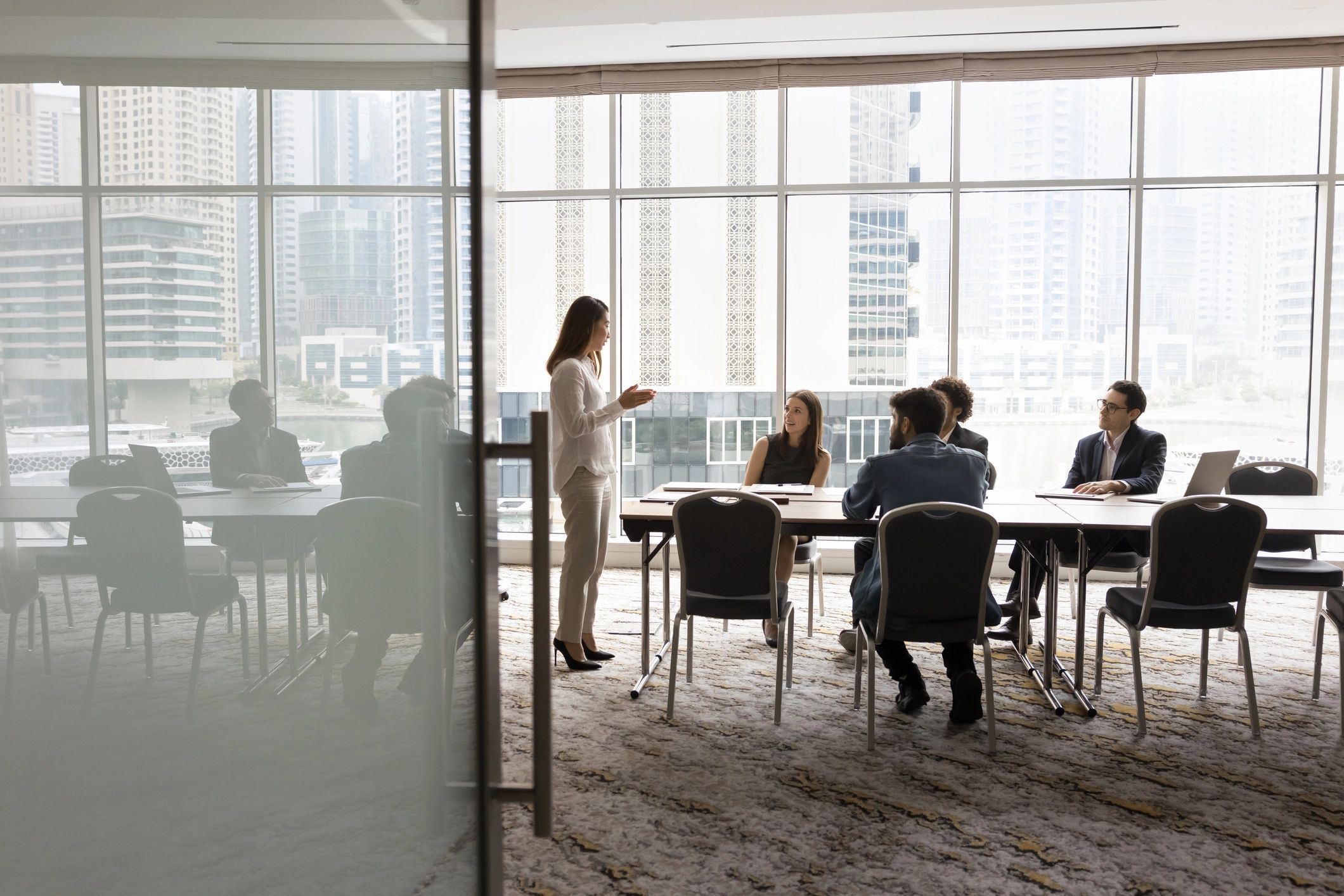 Professional team meeting around a conference table