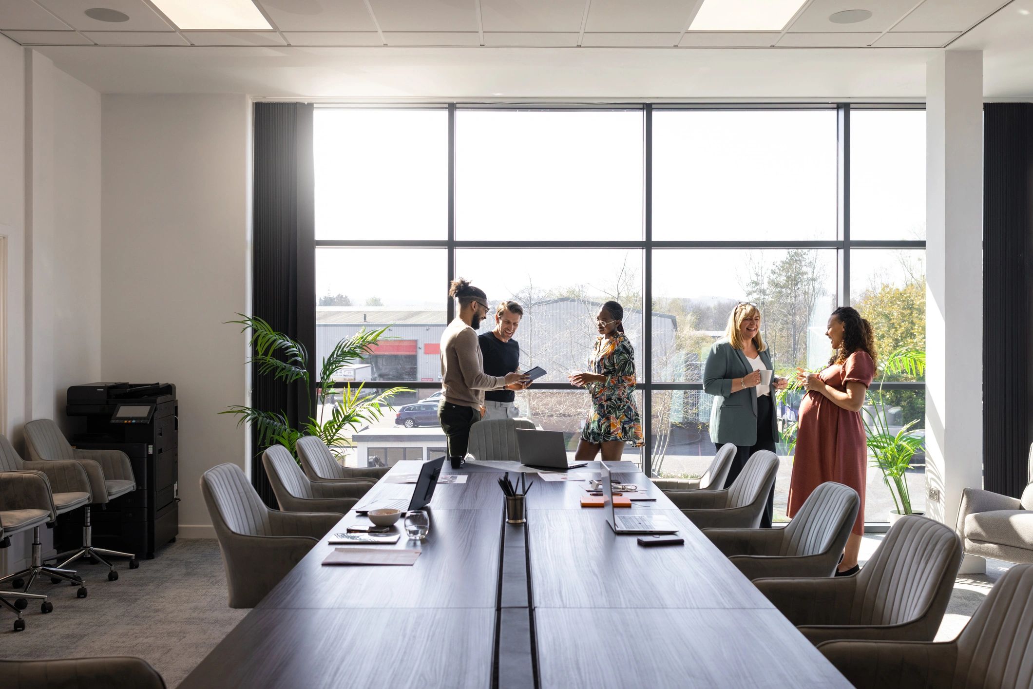 Business colleagues discussing strategy in a conference room