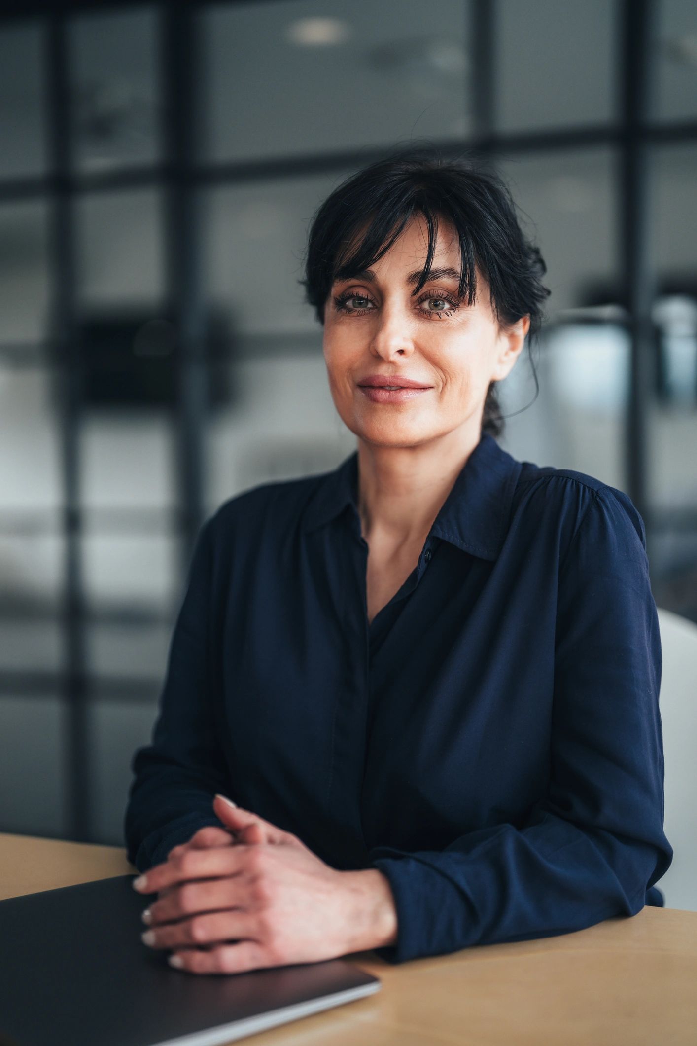Professional consultant seated in a modern office
